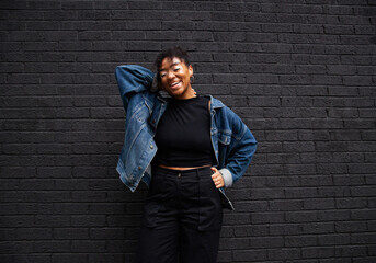 Image of woman happy standing on wall